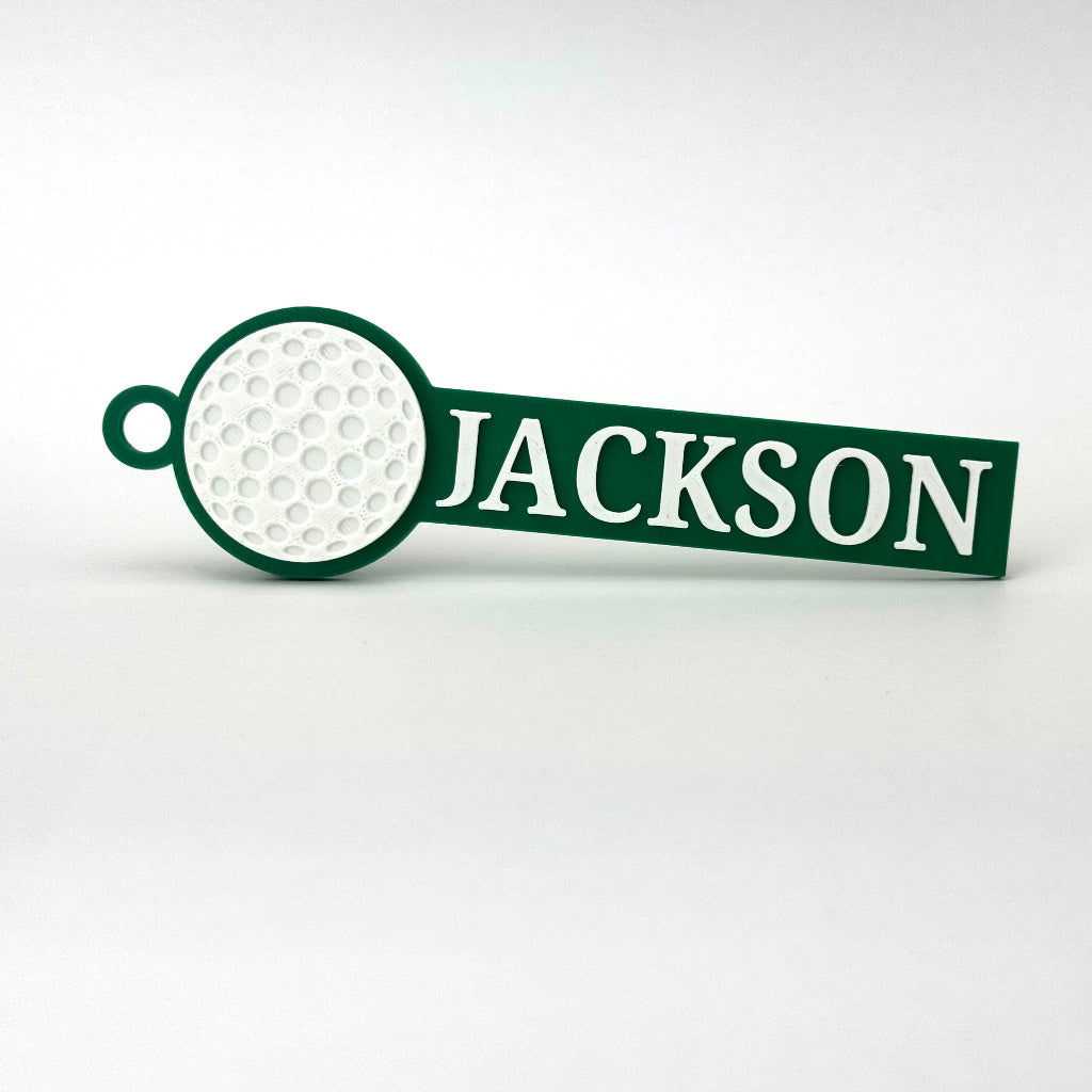 Example of custom sports bag tags with golf in green and white