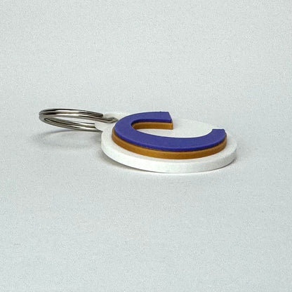 Side view of Cartersville Purple Hurricanes Small Keychain